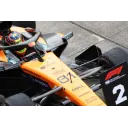 Оскар Піастрі за кермом McLaren на трасі в Японії